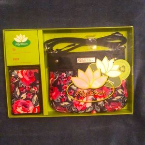 Brand new Lilly Bloom purse and wallet set. Never used or opened.